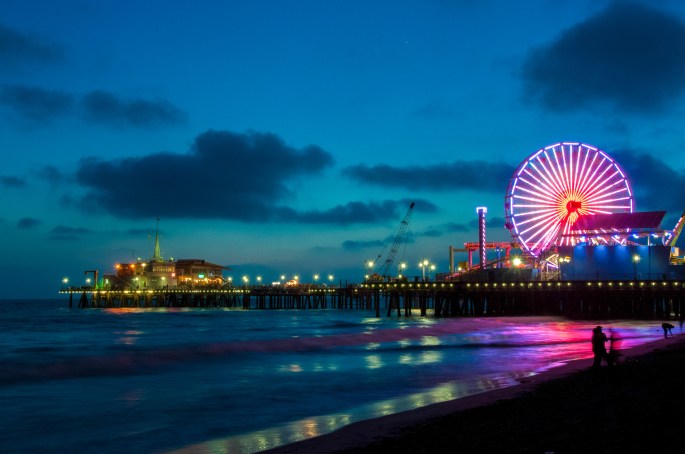 Amusement park on the pier in Santa Monica at night, Los Angeles, California, USA